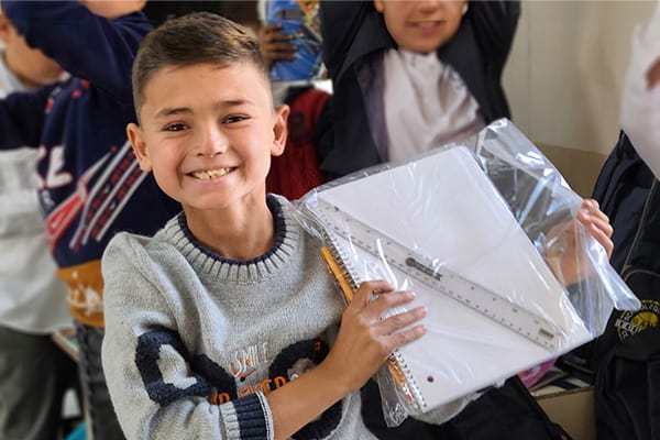 Student receives school supplies